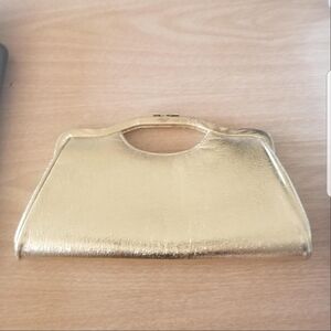 Vintage 1950's Metallic Gold Unique Shaped Clutch With Gold Tone Clasp.